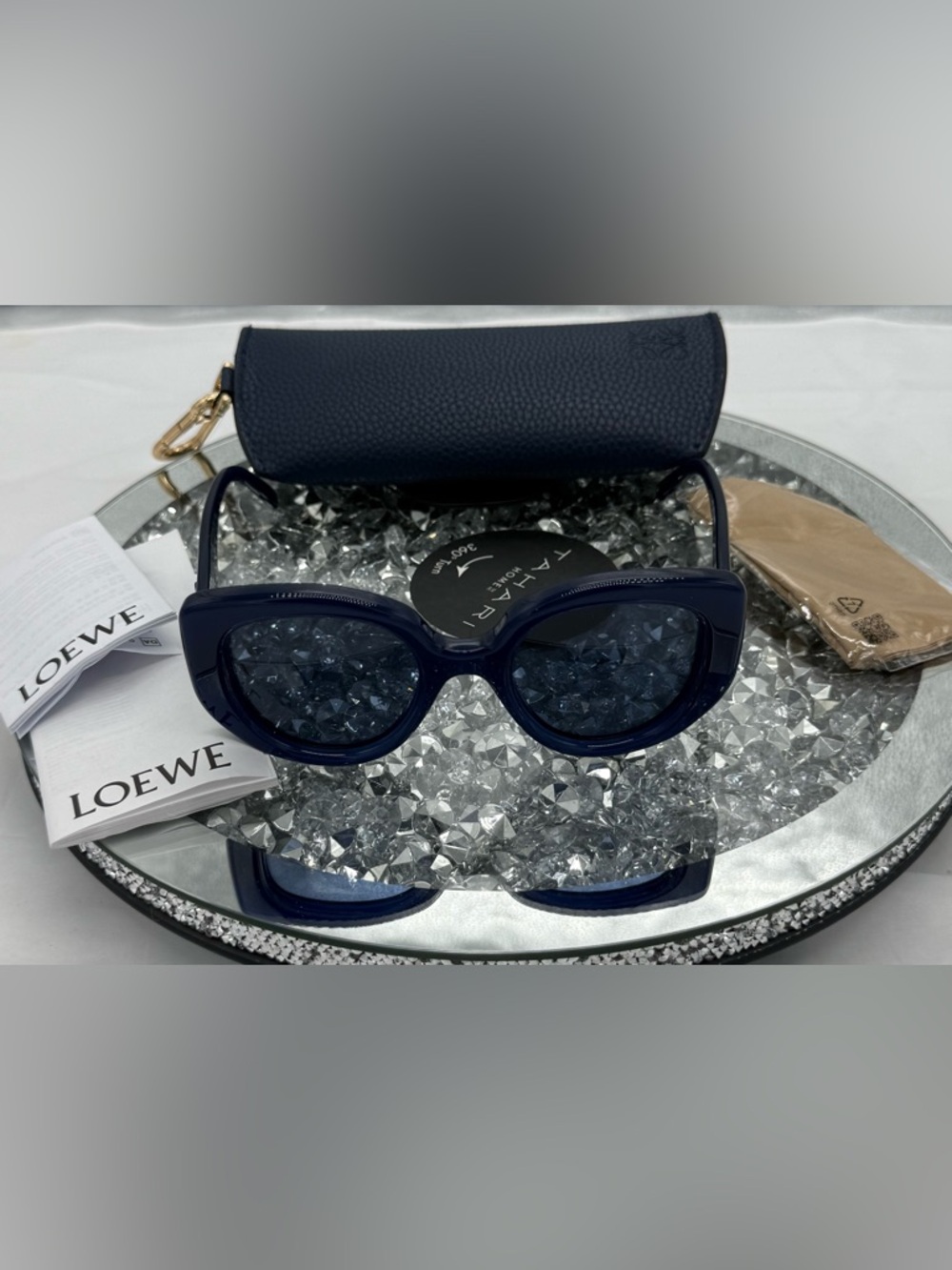 LOEWE LW40100I sunglasses in shiny blue, featuring a butterfly acetate frame.
